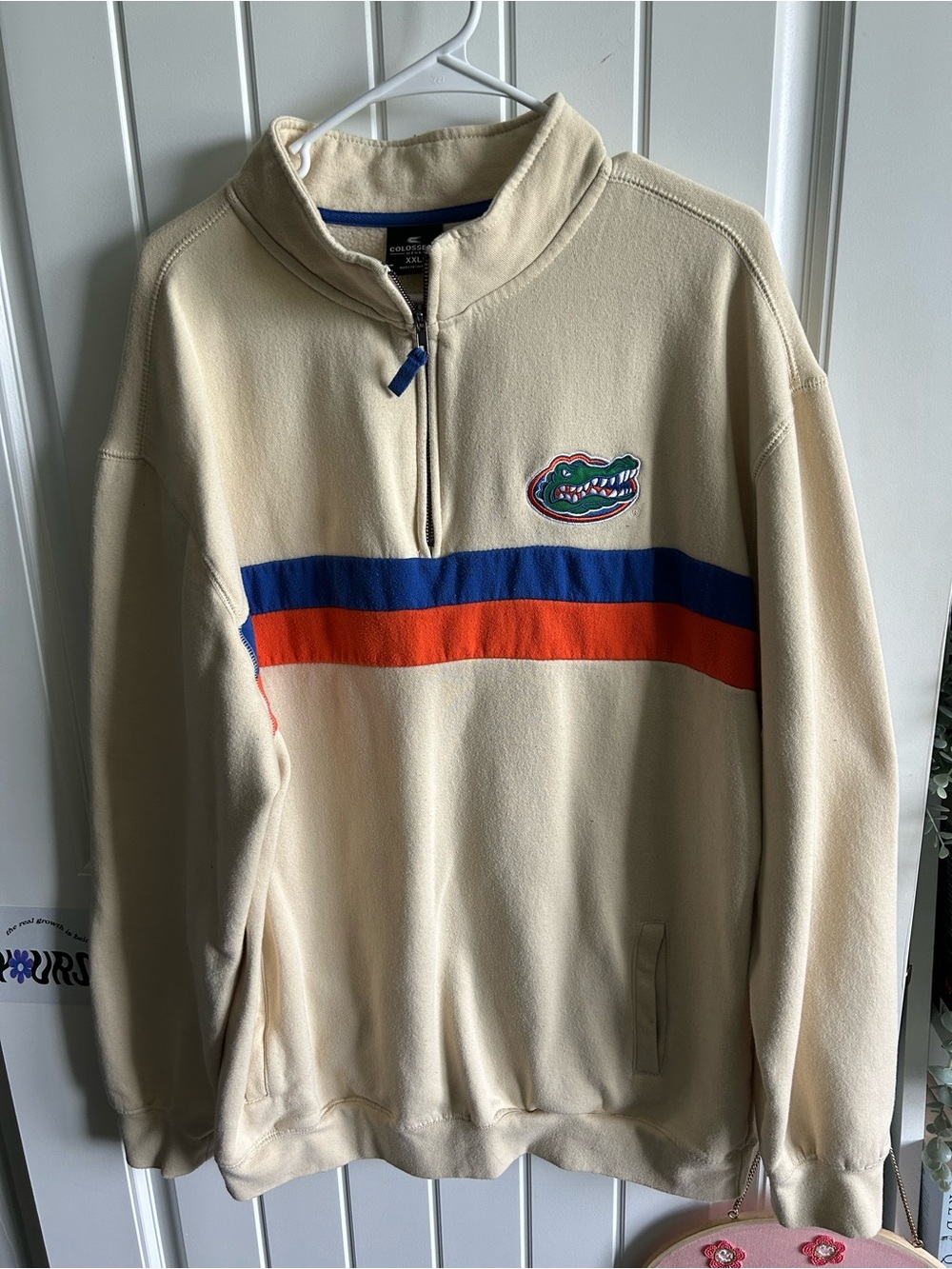 Colosseum Cream 1/4-Zip Pullover with Blue and Orange Stripes